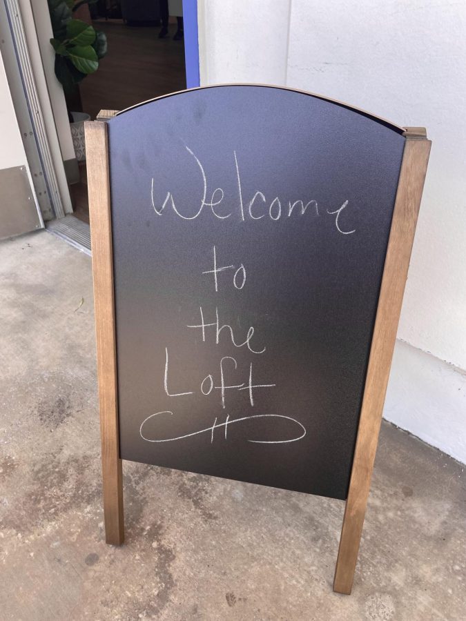 The welcome sign outside of the Loft in room 653.