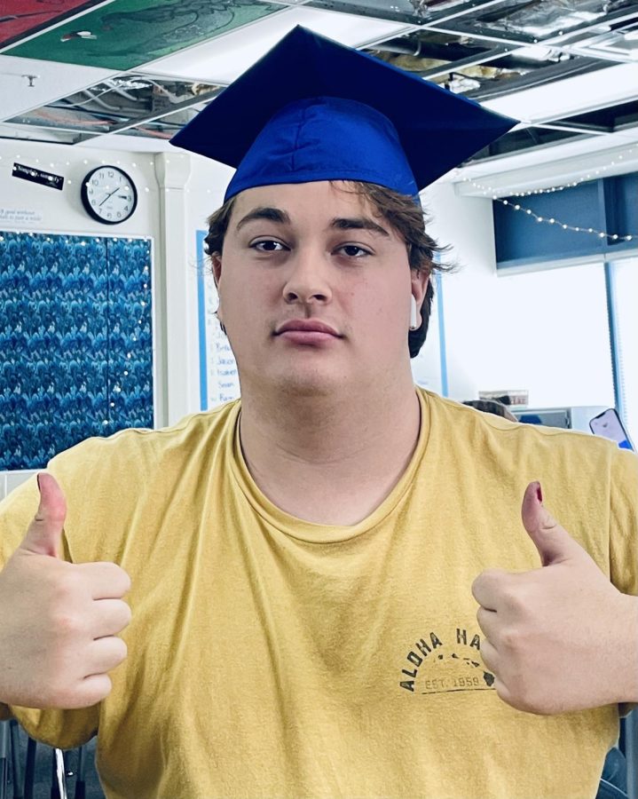 A photo of a distressed senior in a graduation cap