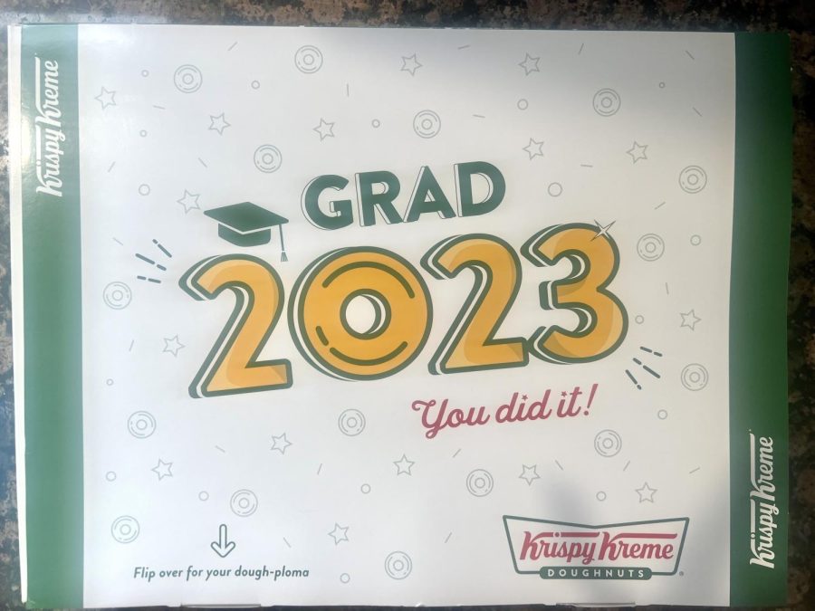 The+box+of+the+2023+Krispy+Kreme+graduation+free+donut+promotion.