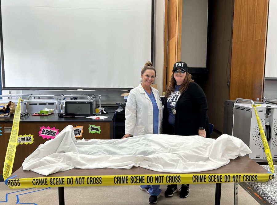 Mrs. Bright (left) in her scrubs and Mrs. Fox (right) in her FBI uniform at the scene of the crime.
