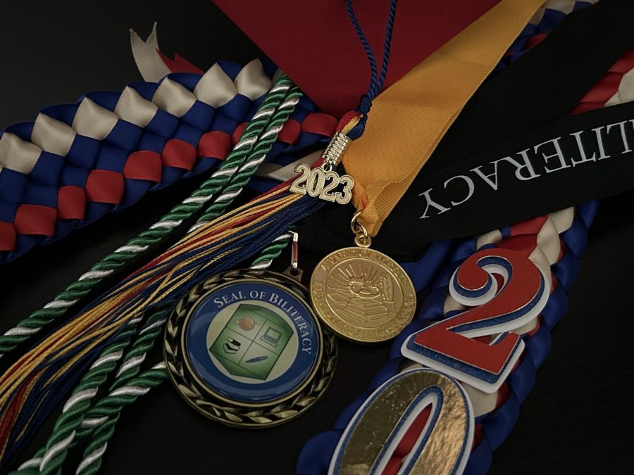 This years tassel and awards that students are expected to wear in order to recognize their accomplishments.