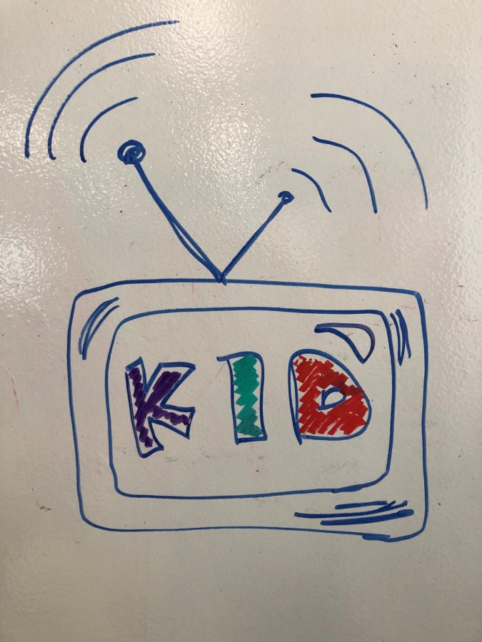 A drawing of a TV broadcasting a childrens show titled Kid.