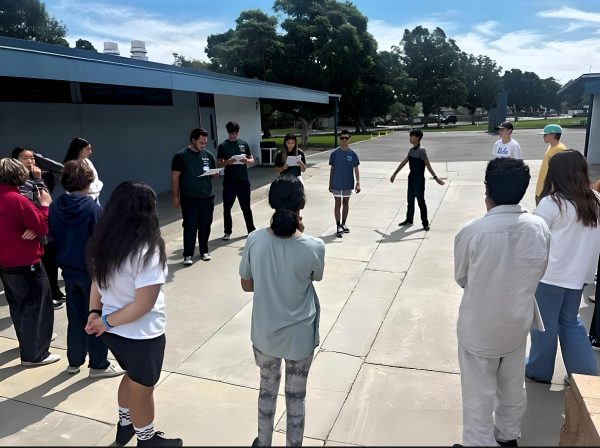 Students participating in group activities with their leaders during the GWAM freshman retreat.