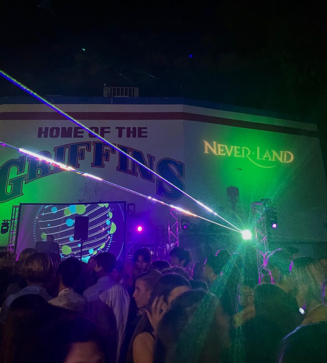 Lights+and+students+fill+the+dance+floor+at+the+2023+Neverland+themed+Homecoming+Dance.