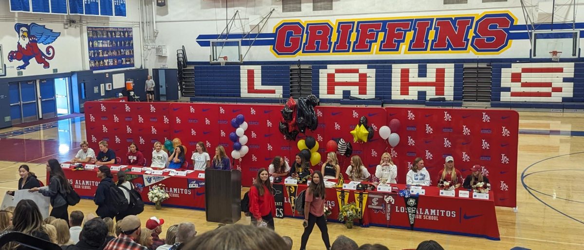 The 18 students wait to officially commit to their colleges before the ceremony begins. 