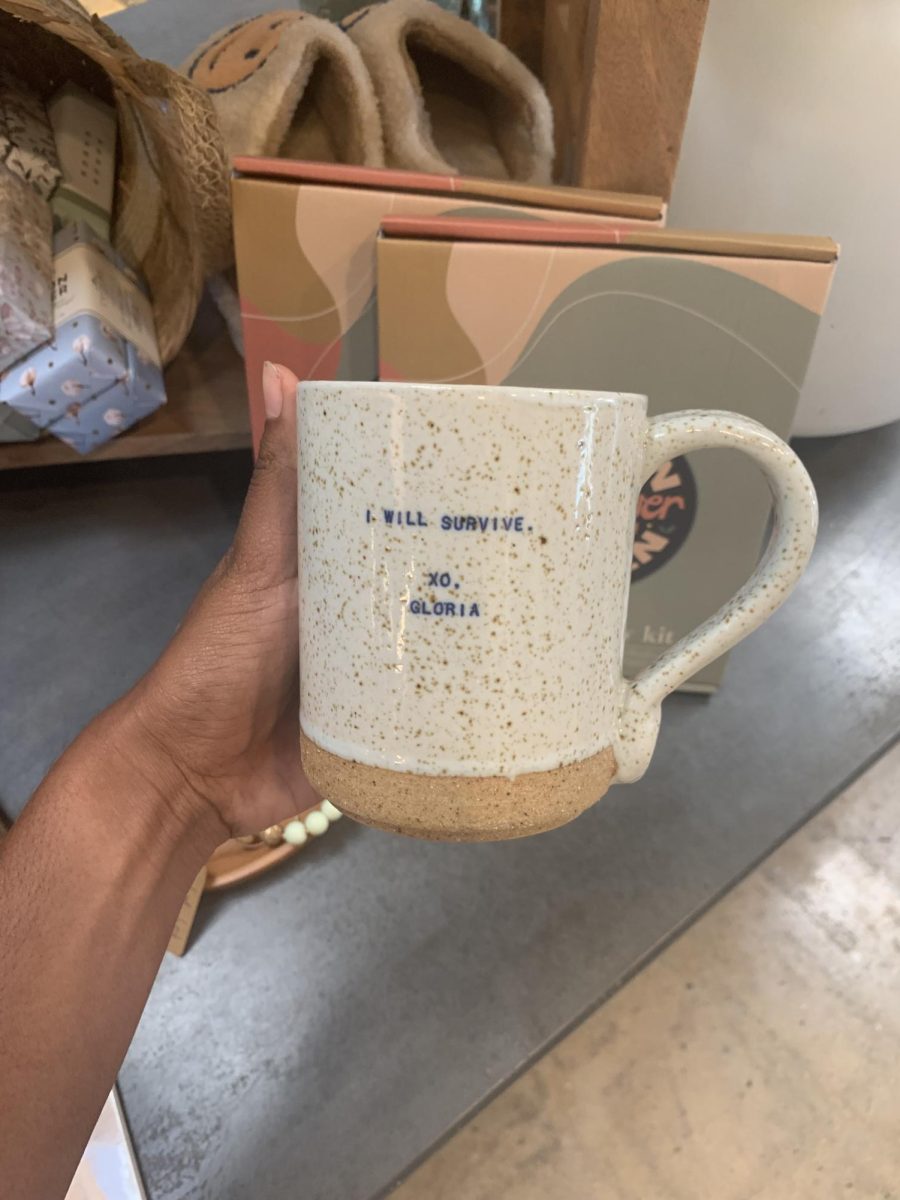 A dainty mug selling at Devins Flower District with I will survive written across as a staple winter affirmation.