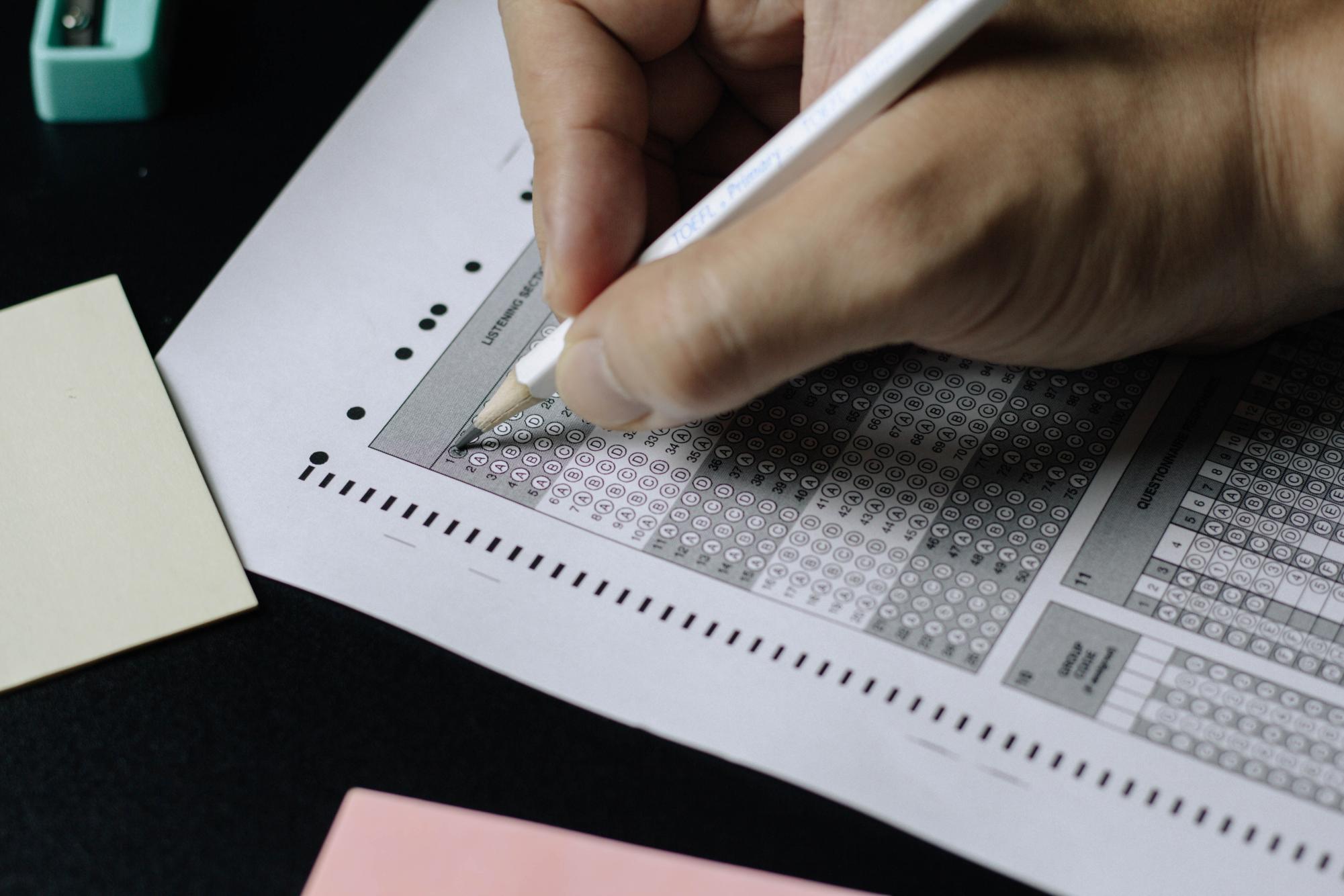 A student begins to take a difficult multiple choice test.