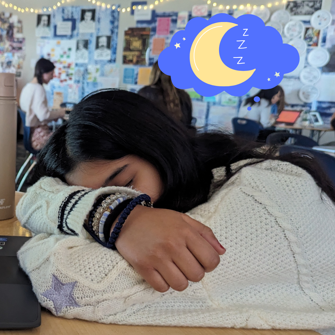 Student during her fourth period falls asleep due to her lack of sleep while doing her school work.