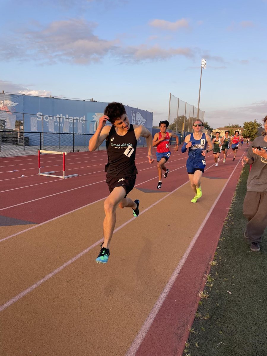 Gavin Ordinario pushing it in the 800 meter run after winning the 1600 meter run a couple hours before. 