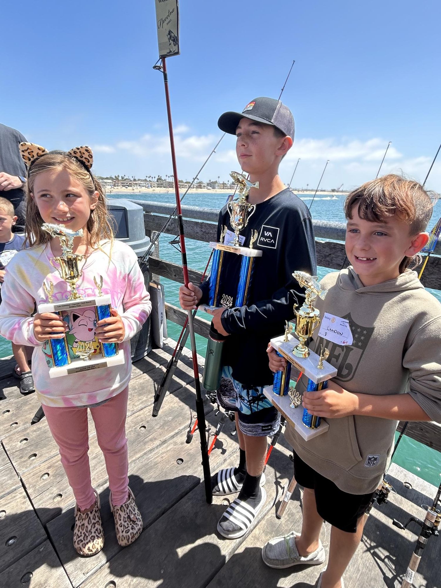 The three Fishing Derby winners of the 7-11 age category. 