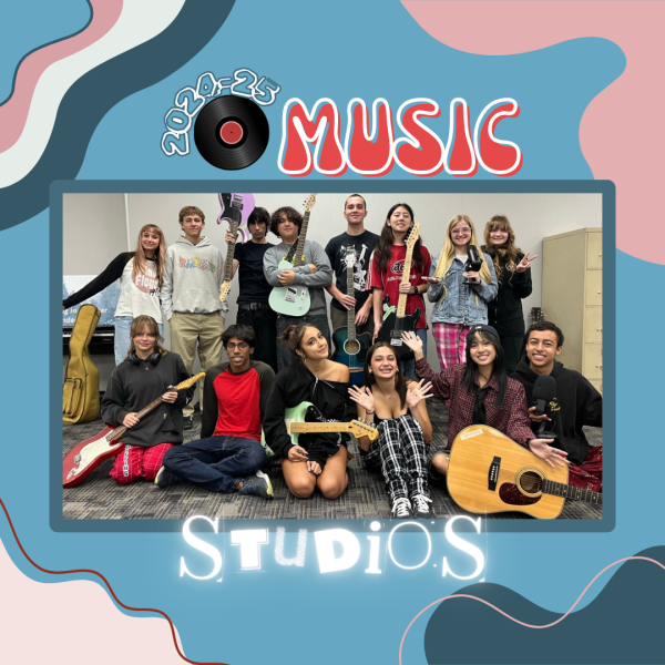 The Music Studio class gathers for a class photo with their instruments.