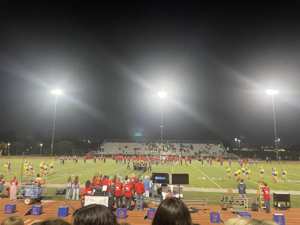 Students in cheer, dance, band and more gathered for halftime and performed together to warm up the crowd.