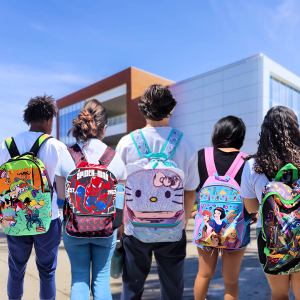 Seniors at LAHS wear kids' backpacks with pride.