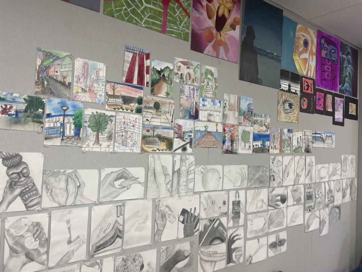 An LAHS drawing and painting classroom that has student artwork displayed on the walls.