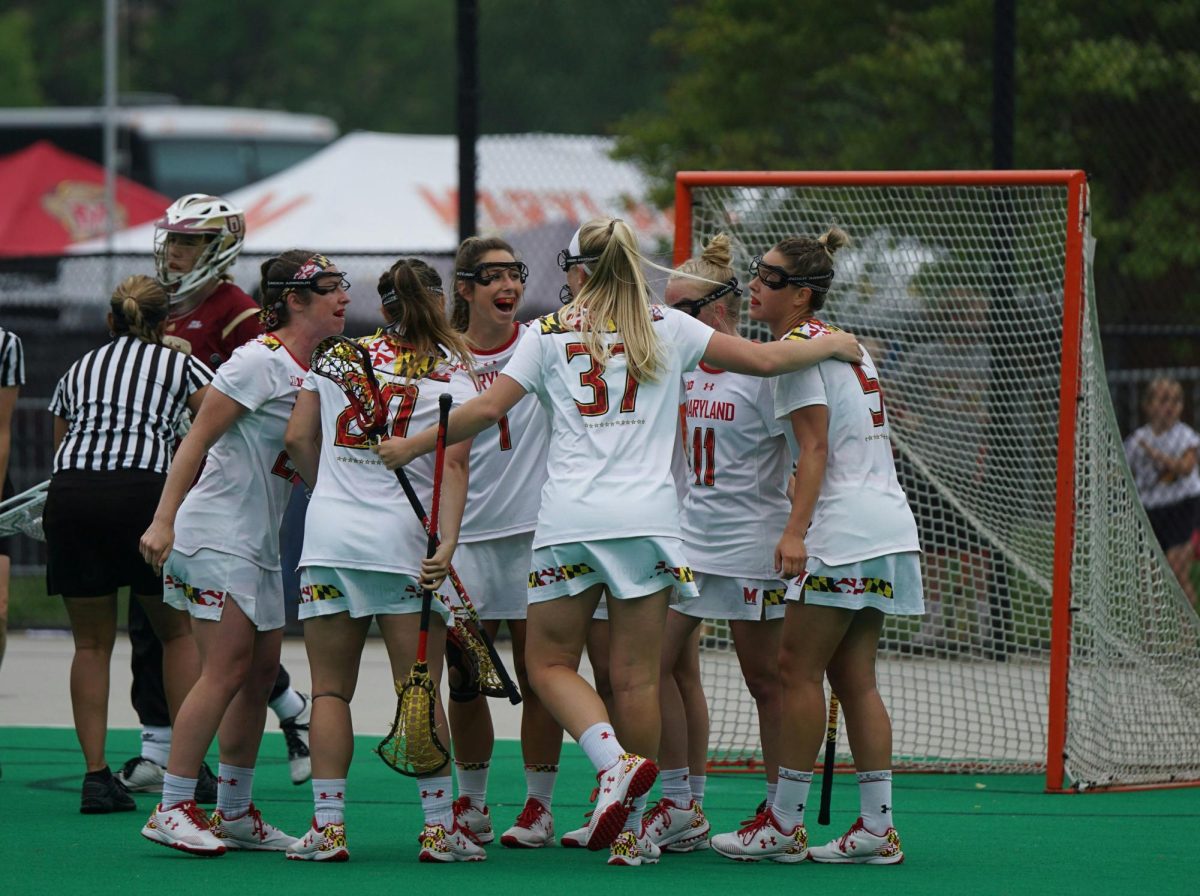 Women lacrosse players celebrating a goal. (Photo courtesy of Jeffrey F. Lin, Unsplash)