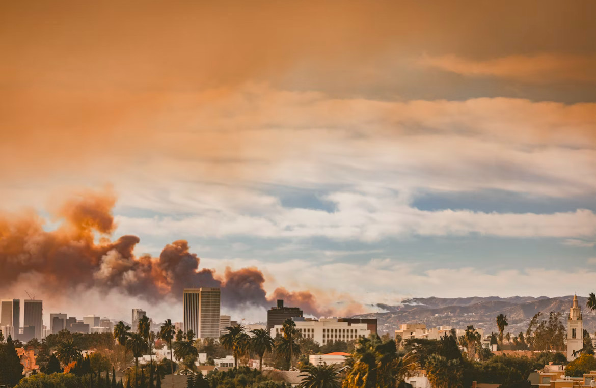 Smoke coming from hills in LA from wildfires. (Photo courtesy of Jessica Christian, Unsplash)