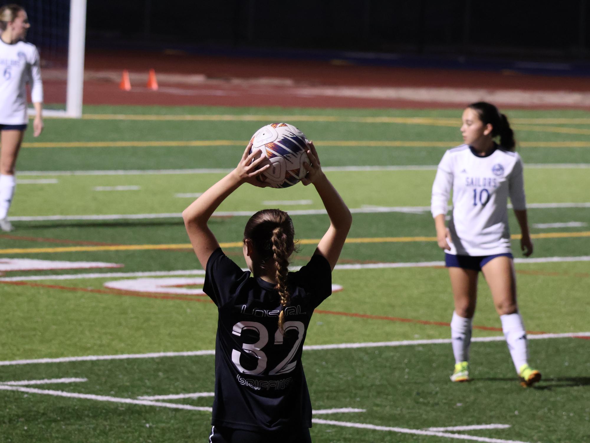 Cameron Ainslie performs a throw-in during the fast-paced game. 