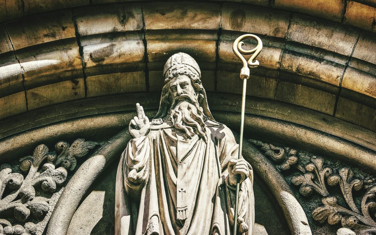 A statue of St. Patrick welcoming visitors into the Belfast's City Centers church.(Photo courtesy of K. Mitch Hodge, Unsplash)