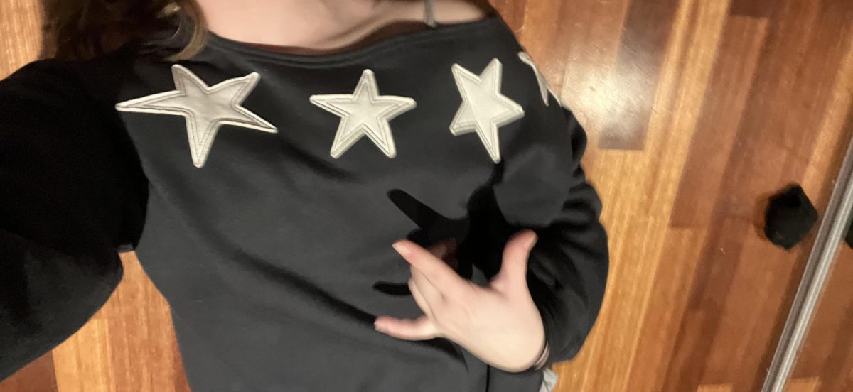 This is an off-the-shoulder top I found at the front of a generic store. One might argue that it is also 2000's inspired because of the stars.