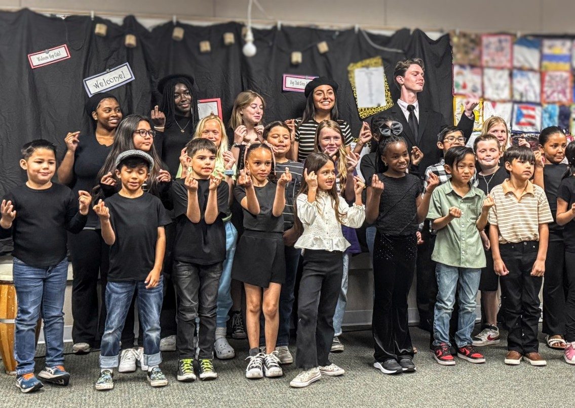 LAHS and McGaugh at the poetry slam event at McGaugh Elementary, which was held to celebrate the success of the pen-pal program between the two schools. (Photo courtesy of Leanna McGregor)