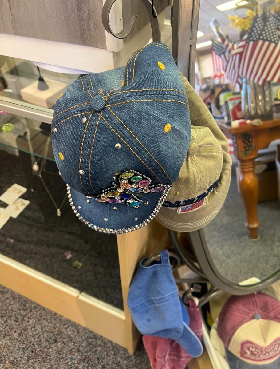 Different vintage hats at the the front of a generic store.