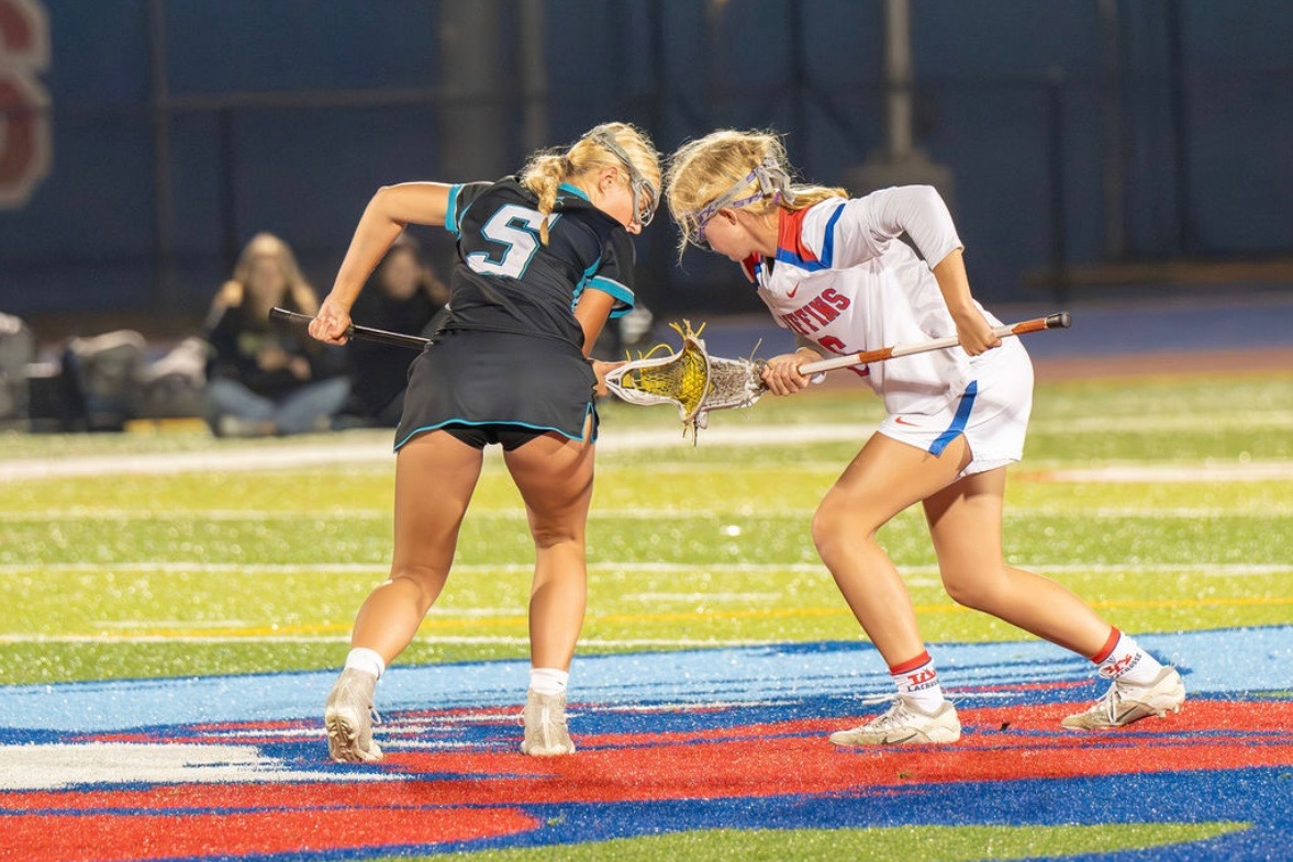 Amalia Berthon crushing her opponents on the lacrosse field. (Photo courtesy of Tim de Shazer)