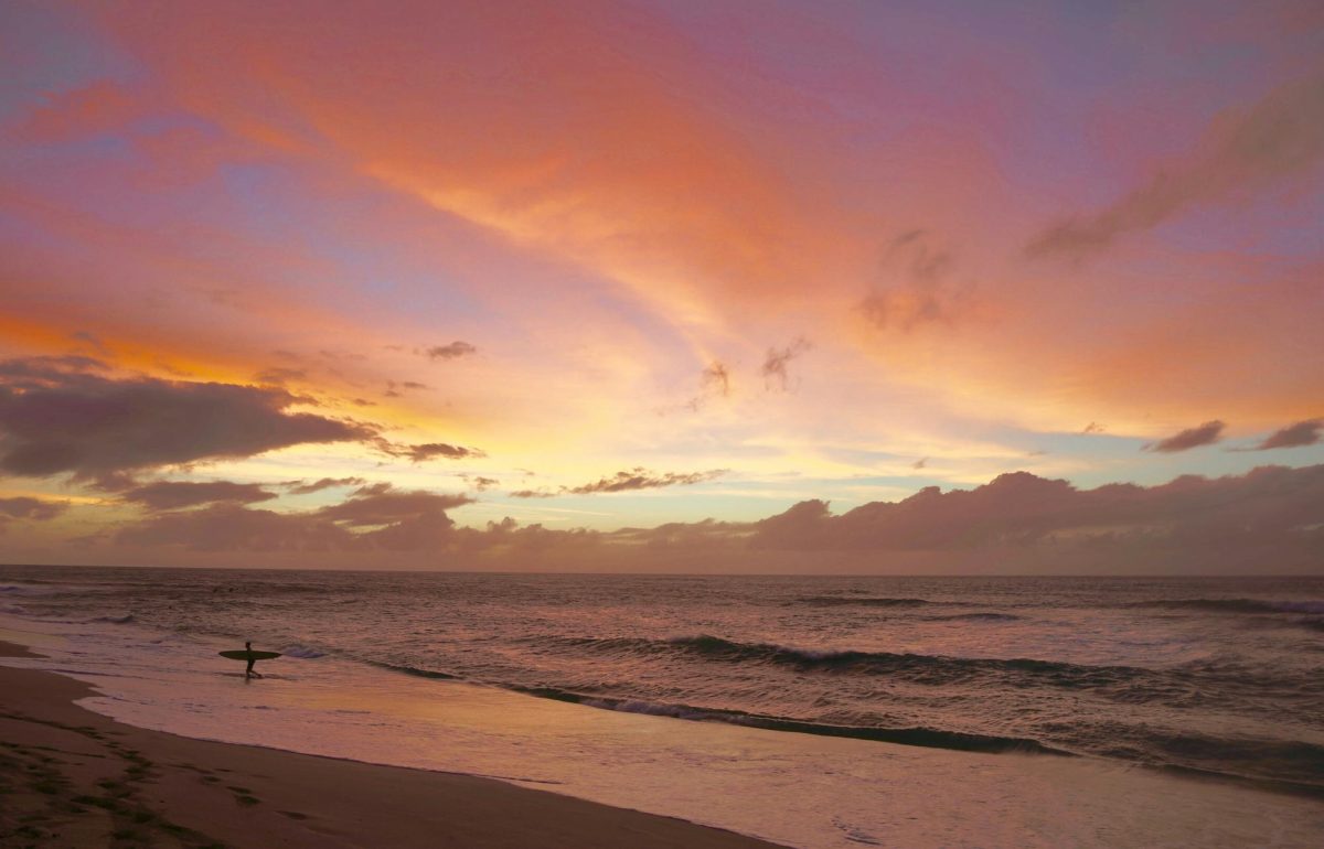 Scenic sunsets are a key feature of summer destinations. (Photo Courtesy of Joe Cook via Unsplash)
