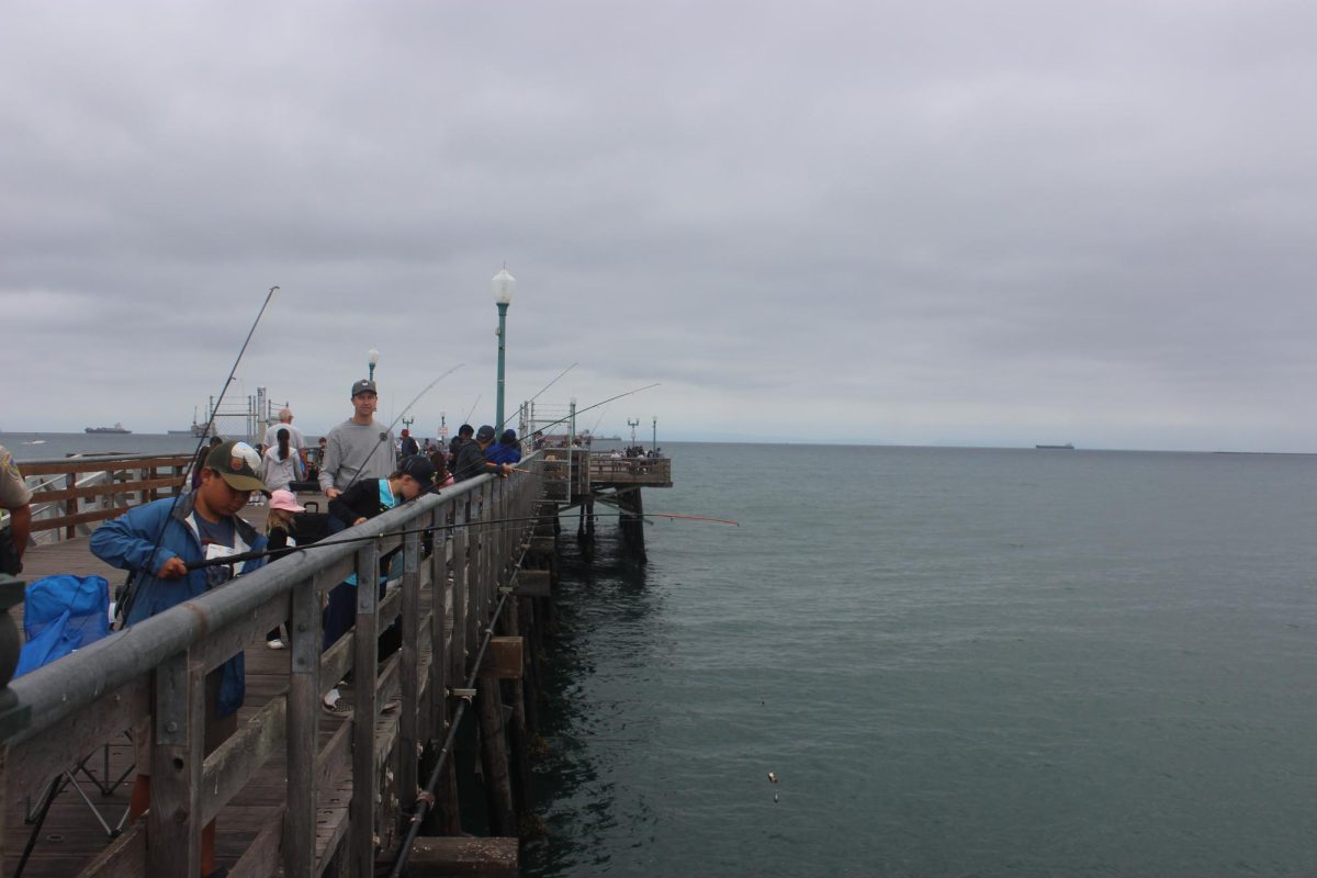 Nearly 400 young fishers cast off of the Seal Beach pier.