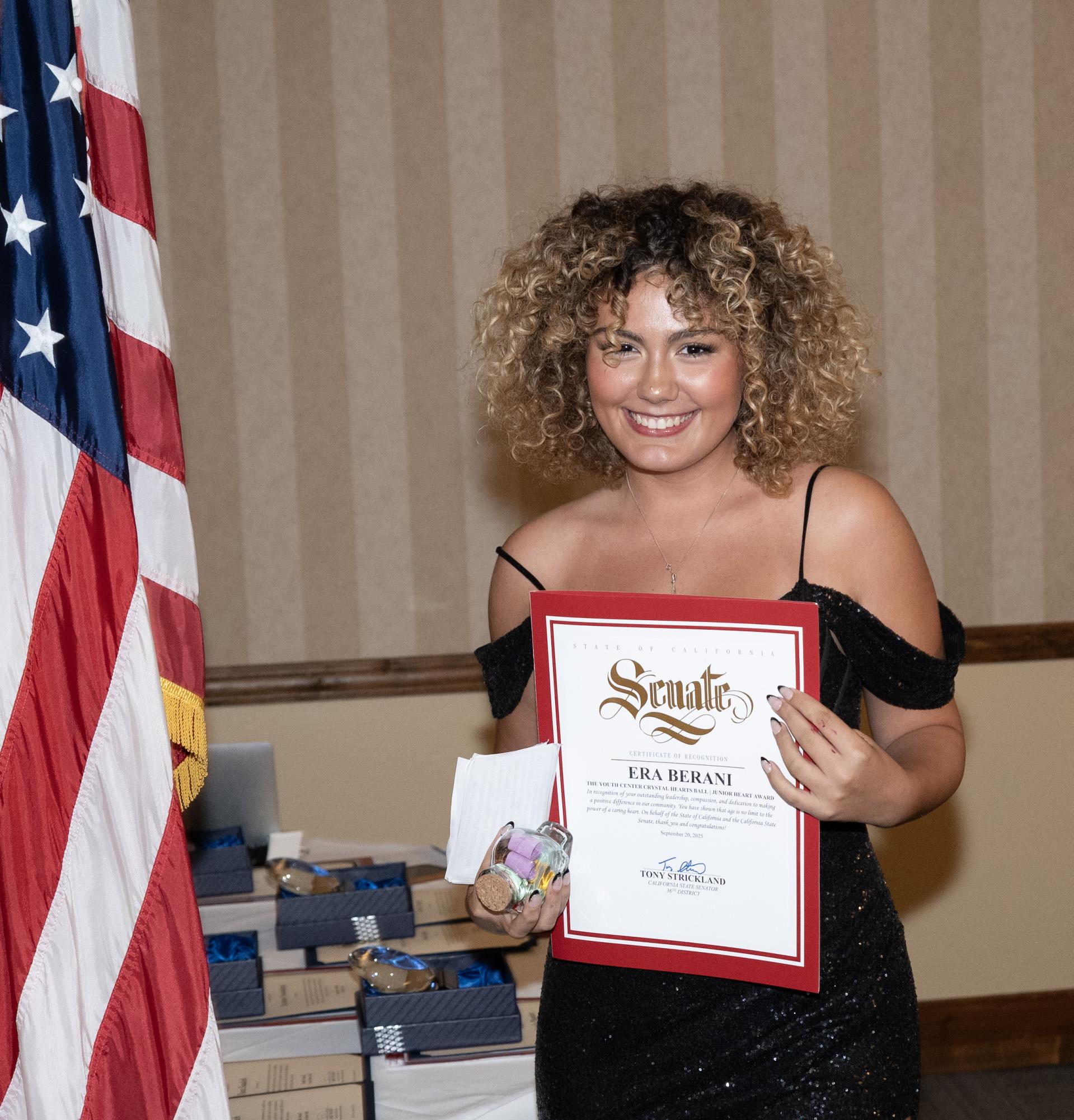 Era Berani received the Junior Crystal Hearts award for her dedication to helping others. (Photo courtesy of Tim De Shazer)
