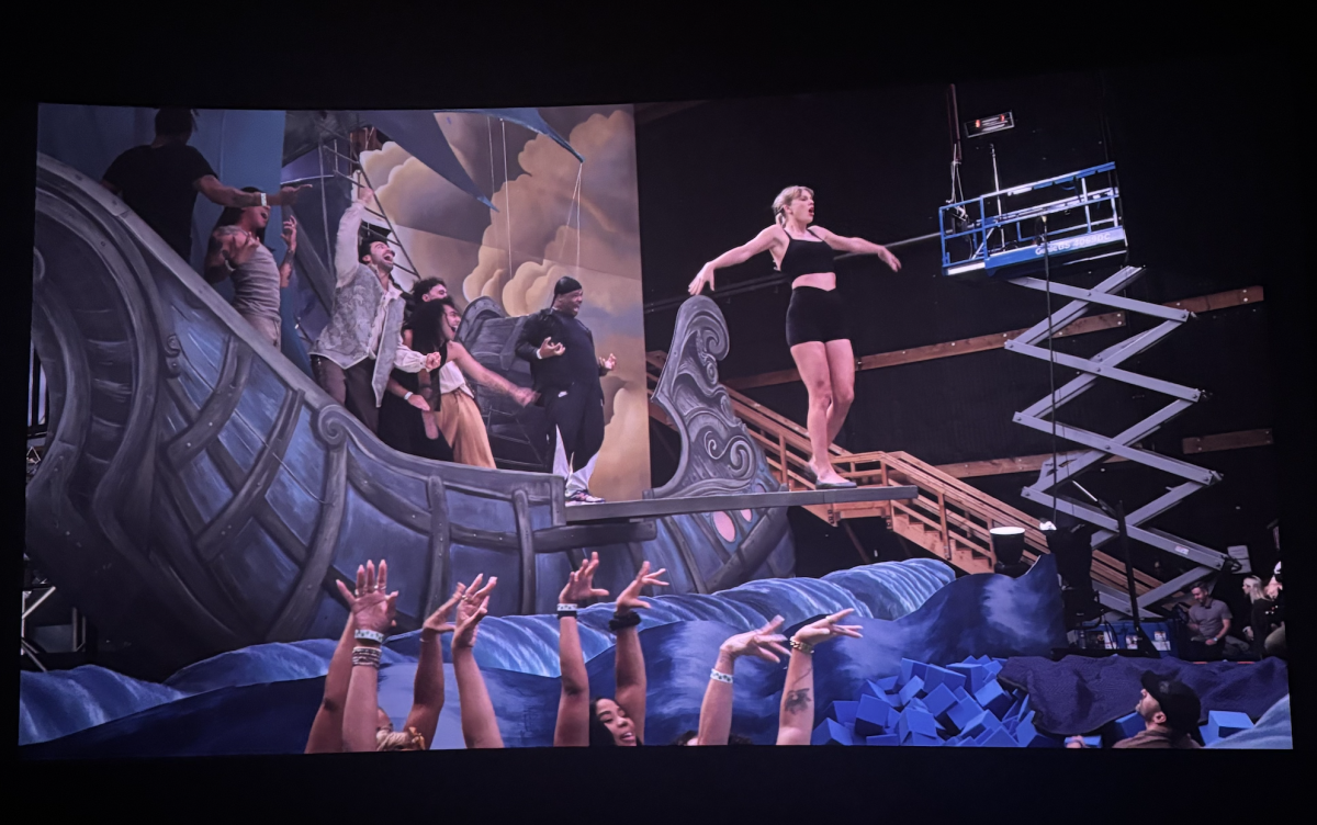 One behind the scenes clip shows footage of Swift practicing her jump from a prop ship