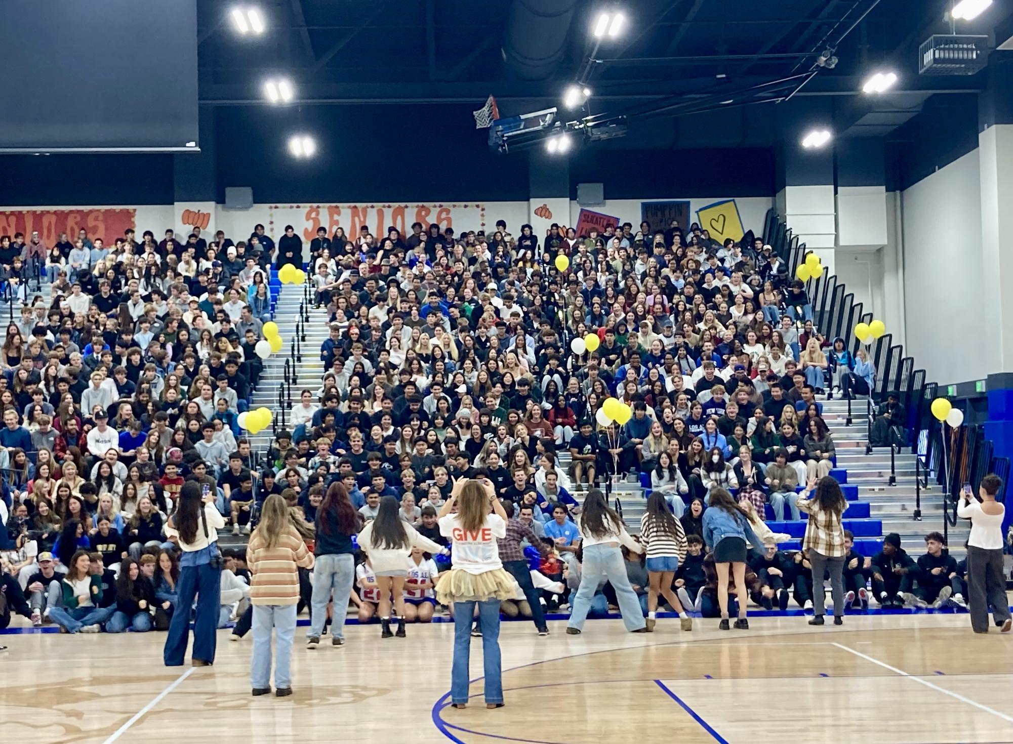 The seniors get ready to do the traditional roller coaster.