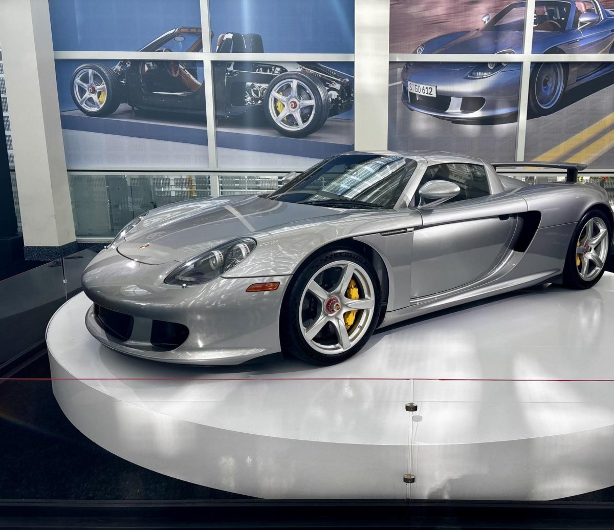 A Porsche Carrera GT displayed near the entrance of the Convention Center.