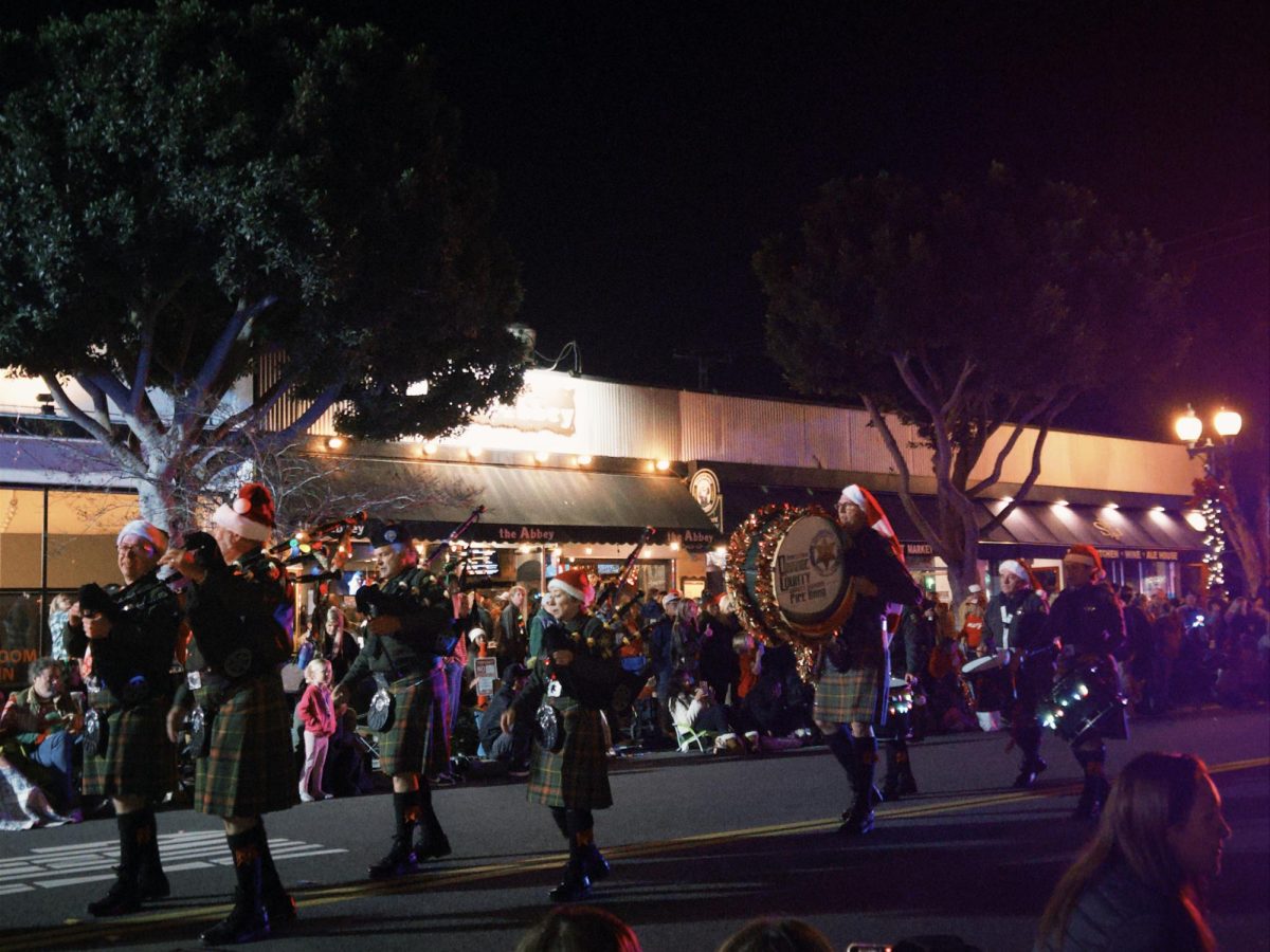 The Association of Orange County Deputy Sheriff's Pipe Band was just one of the many marching groups performing Christmas classics. 