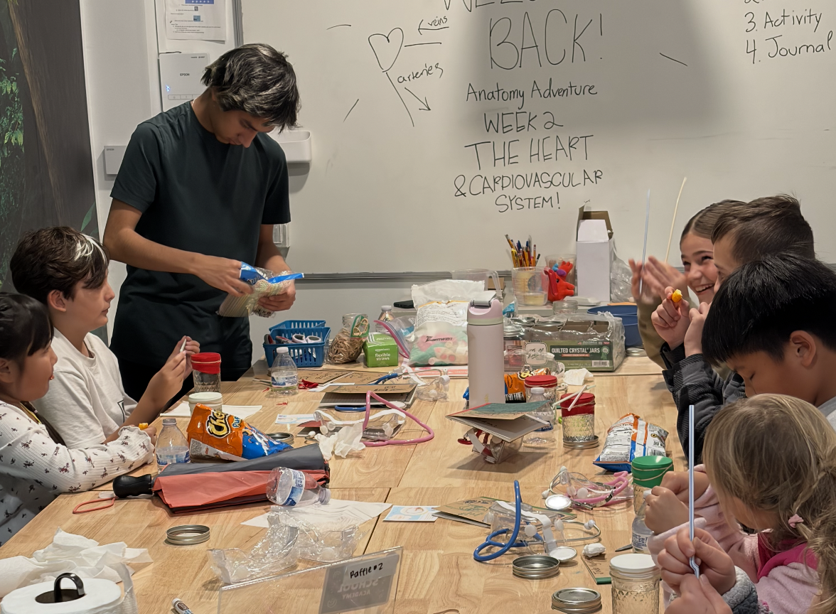 During one class, students modeled blood pumping through the heart. (Photo Courtesy of The Youth Center)