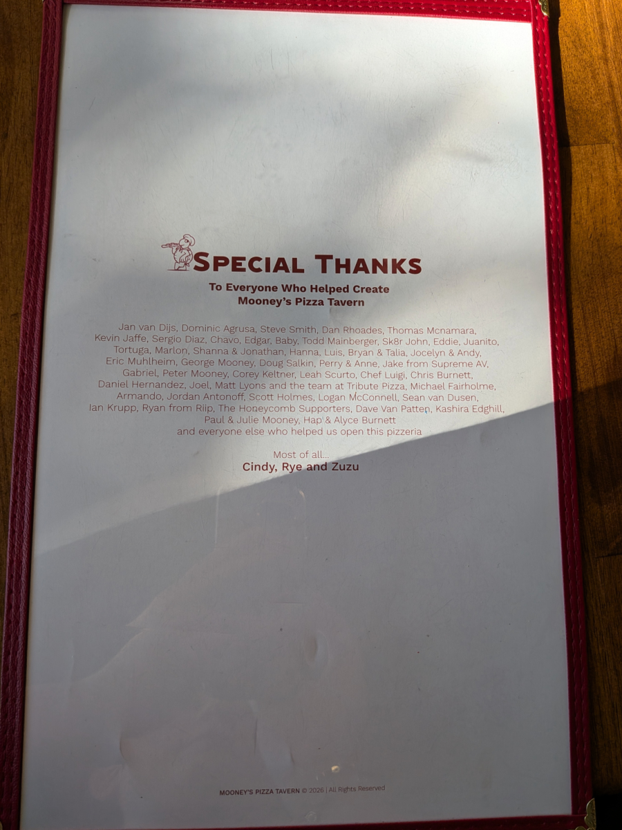 On the back of every menu, there is a "thank you" message to all who helped make Mooney's Pizza come to life. 